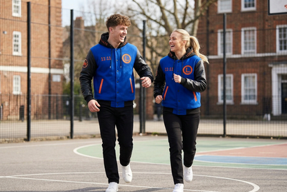 Young adult couple being active in the 11:11 Manifest jackets